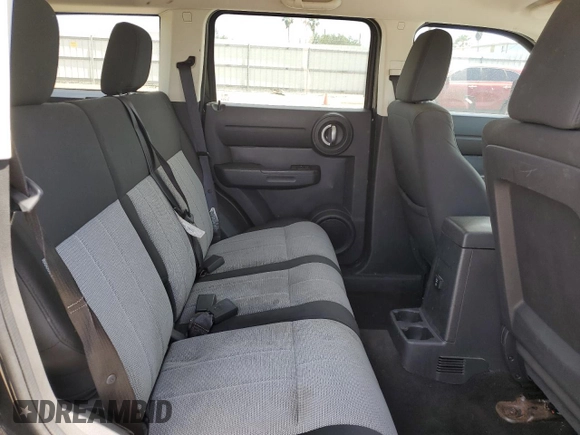2009 Dodge Nitro SXT with VIN 1D8GU28KX9W542982, listed as a Copart auction lot 50878304 with 137,893 mi miles and Salvage Title. Bid and sale history available at DreamBid. Image 10.