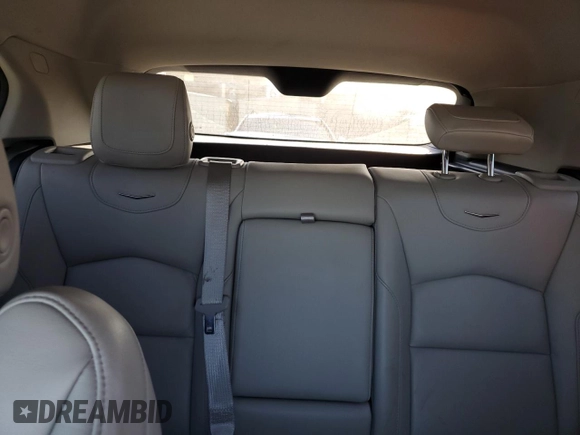 2023 Cadillac XT4 FWD Premium Luxury z VIN 1GYFZCR44PF175022, wystawiony jako Copart lot #49214855 z przebiegiem 50 234 mil mil oraz Nie do naprawy • Non repairable. Historia ofert i sprzedaży dostępna na DreamBid. Obrazek 10.