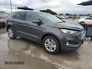 2019 Ford Edge SEL z VIN 2FMPK4J92KBB21770, wystawiony jako Copart lot #56056585 z przebiegiem 64 042 mil mil oraz Szkoda całkowita • Salvage title. Historia ofert i sprzedaży dostępna na DreamBid. Obrazek 4.