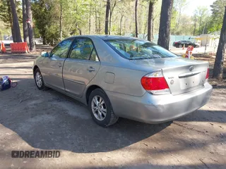 2005 Toyota Camry LE with VIN 4T1BF32K25U612669, listed as a IAAI auction lot 41987399 with 315,639 mi miles and . Bid and sale history available at DreamBid. Image 3.