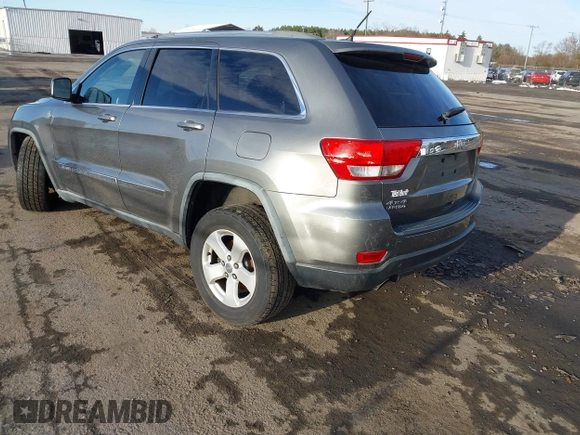 2011 Jeep Grand Cherokee 70th Anniversary with VIN 1J4RR4GT6BC715848, listed as a IAAI auction lot 41562152 with 119,910 mi miles. Bid and sale history available at carsss.com. Image 3.