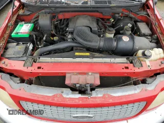 1999 Ford F-150 with VIN 1FTRX17W3XNA26575, listed as a Copart auction lot 81508484 with 138,704 mi miles and Salvage title. Bid and sale history available at DreamBid. Image 11.