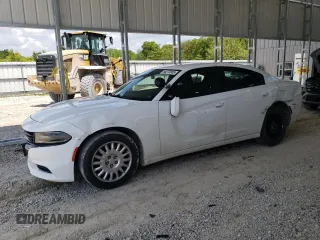 2019 Dodge Charger Police with VIN 2C3CDXKT5KH600548, listed as a Copart auction lot 56278305 with 94,727 mi miles and Salvage title. Bid and sale history available at DreamBid. Image 1.