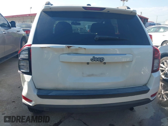 2016 Jeep Compass Sport with VIN 1C4NJCBA7GD705620, listed as a IAAI auction lot 42252671 with 105,903 mi miles and . Bid and sale history available at DreamBid. Image 13.