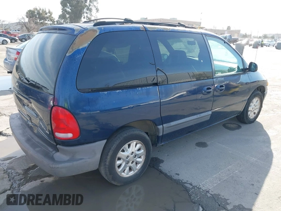 2000 Dodge Caravan SE with VIN 2B4GP45R9YR661145, listed as a IAAI auction lot 41819130 with 233,411 mi miles and . Bid and sale history available at DreamBid. Image 4.