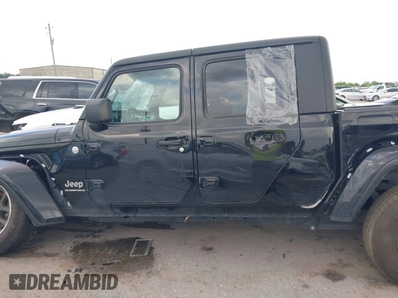 2023 Jeep Gladiator Overland z VIN 1C6HJTFG2PL523686, wystawiony jako IAAI lot #42134627 z przebiegiem 33 575 mil mil oraz . Historia ofert i sprzedaży dostępna na DreamBid. Obrazek 14.