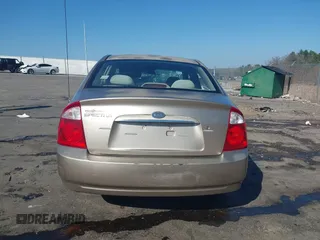 2004 Kia Spectra LX with VIN KNAFE121745039519, listed as a IAAI auction lot 41482402 with 201,123 mi miles. Bid and sale history available at carsss.com. Image 17.
