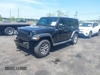 2023 Jeep Wrangler Sport S with VIN 1C4HJXDN5PW671167, listed as a IAAI auction lot 42176127 with 1,230 mi miles and . Bid and sale history available at DreamBid. Image 18.
