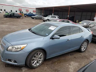 2013 Chevrolet Malibu LTZ with VIN 1G11H5SA0DU109940, listed as a IAAI auction lot 42106086 with 205,634 mi miles and . Bid and sale history available at DreamBid. Image 14.