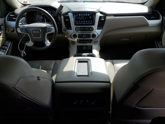 2020 GMC Yukon SLT with VIN 1GKS1BKC3LR238700, listed as a Copart auction lot 74897254 with 82,806 mi miles and Salvage Title. Bid and sale history available at DreamBid. Image 8.