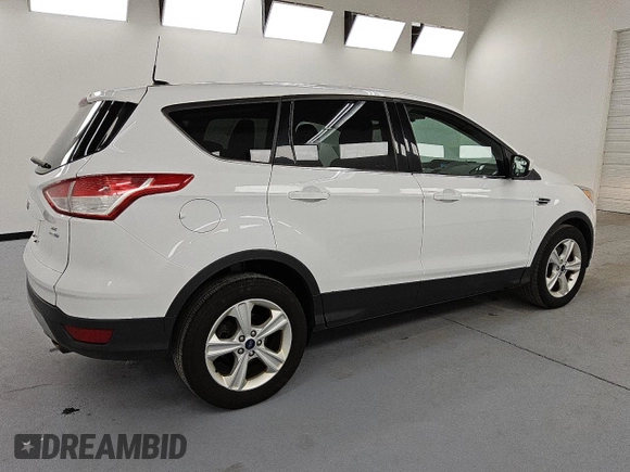 2015 Ford Escape SE with VIN 1FMCU9G90FUB09601, listed as a Copart auction lot 54174665 with 84,560 mi miles and Clean Title. Bid and sale history available at DreamBid. Image 3.