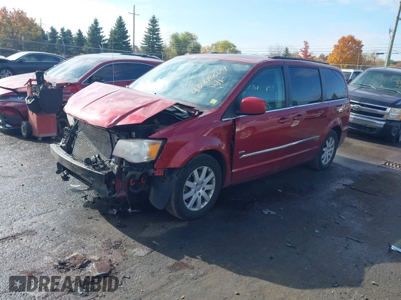 2013 Chrysler Town & Country Touring with VIN 2C4RC1BG0DR634631, listed as a IAAI auction lot 40686174 with 143,206 mi miles. Bid and sale history available at carsss.com. Image 2.