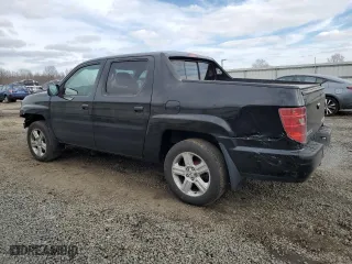 2010 Honda Ridgeline RTL with VIN 5FPYK1F57AB010749, listed as a Copart auction lot 45884225 with 165,016 mi miles and Salvage Title. Bid and sale history available at carsss.com. Image 2.