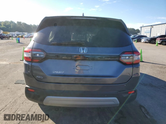 2024 Honda Pilot EX-L 8 Passenger with VIN 5FNYG1H49RB041981, listed as a Copart auction lot 73479824 with 8,758 mi miles and Salvage Title. Bid and sale history available at carsss.com. Image 6.