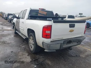 2013 Chevrolet Silverado 1500 LT with VIN 3GCPCSE02DG170890, listed as a IAAI auction lot 41462129 with 140,958 mi miles and . Bid and sale history available at DreamBid. Image 3.