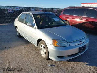 2003 Honda Civic Hybrid with VIN JHMES956X3S019115, listed as a IAAI auction lot 41214960 with 303,472 mi miles. Bid and sale history available at carsss.com. Image 6.
