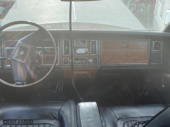 1982 Cadillac Seville with VIN 1G6AS6989CE694210, listed as a Copart auction lot 74978254 with 21,412 mi miles and Clean Title. Bid and sale history available at carsss.com. Image 9.