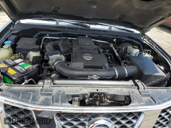 2007 Nissan Frontier SE z VIN 1N6AD06U77C418922, wystawiony jako Copart lot #56603015 z przebiegiem 354 484 mil mil oraz Szkoda całkowita • Salvage title. Historia ofert i sprzedaży dostępna na DreamBid. Obrazek 11.