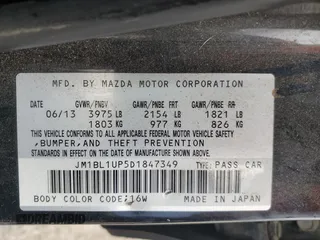 2013 Mazda 3 i Sport with VIN JM1BL1UP5D1847349, listed as a Copart auction lot 61378075 with 157,963 mi miles and Salvage title. Bid and sale history available at DreamBid. Image 12.