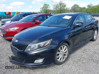 2014 Kia Optima EX z VIN 5XXGN4A71EG340220, wystawiony jako IAAI lot #42176989 z przebiegiem 177 064 mil mil oraz . Historia ofert i sprzedaży dostępna na DreamBid. Obrazek 2.