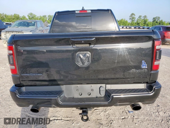 2023 Ram 1500 Big Horn with VIN 1C6SRFFT2PN666039, listed as a Copart auction lot 61458085 with 29,206 mi miles and Salvage title. Bid and sale history available at DreamBid. Image 6.