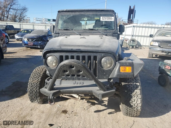 2004 Jeep Wrangler Sport with VIN 1J4FA49S64P717397, listed as a Copart auction lot 82970994 with 0 mi miles and Salvage Title. Bid and sale history available at carsss.com. Image 5.