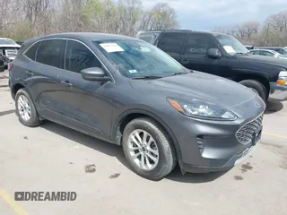 2021 Ford Escape SE with VIN 1FMCU0G61MUB09377, listed as a IAAI auction lot 41897284 with 33,124 mi miles and . Bid and sale history available at DreamBid. Image 1.