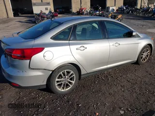 2017 Ford Focus SE with VIN 1FADP3F27HL321914, listed as a IAAI auction lot 40821776 with 87,689 mi miles and . Bid and sale history available at DreamBid. Image 4.