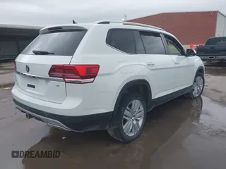 2019 Volkswagen Atlas SE z VIN 1V2WR2CA9KC593891, wystawiony jako IAAI lot #41947078 z przebiegiem 74 525 mil mil oraz . Historia ofert i sprzedaży dostępna na DreamBid. Obrazek 4.