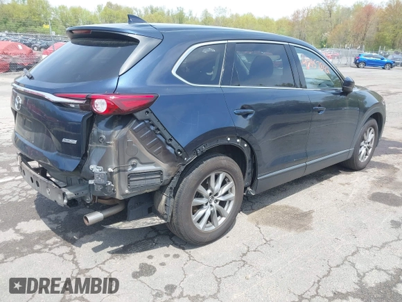 2019 Mazda CX-9 Touring z VIN JM3TCBCY6K0331905, wystawiony jako IAAI lot #42157842 z przebiegiem 84 211 mil mil oraz . Historia ofert i sprzedaży dostępna na DreamBid. Obrazek 4.