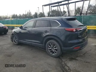2023 Mazda CX-9 Touring with VIN JM3TCBCY4P0653899, listed as a Copart auction lot 50999985 with 32,896 mi miles and Salvage title. Bid and sale history available at DreamBid. Image 2.