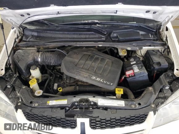 2011 Dodge Grand Caravan R/T with VIN 2D4RN7DG0BR697125, listed as a Copart auction lot 66491484 with 92,987 mi miles and Salvage Title. Bid and sale history available at DreamBid. Image 12.