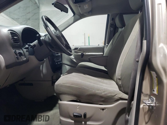 2007 Dodge Grand Caravan SXT with VIN 2D8GP44L57R321927, listed as a Copart auction lot 53143605 with 157,185 mi miles and Salvage Title. Bid and sale history available at DreamBid. Image 7.