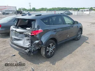 2017 Toyota RAV4 LE with VIN JTMBFREV6HD205665, listed as a IAAI auction lot 42436639 with 217,744 mi miles and . Bid and sale history available at DreamBid. Image 4.