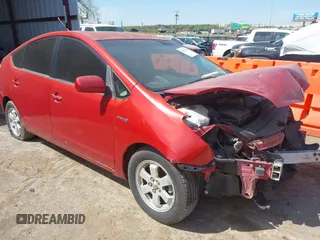2009 Toyota Prius z VIN JTDKB20U197856400, wystawiony jako IAAI lot #42017716 z przebiegiem 215 986 mil mil oraz . Historia ofert i sprzedaży dostępna na DreamBid. Obrazek 1.