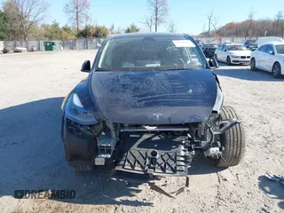 2024 Tesla Model Y with VIN 7SAYGDED3RF092501, listed as a IAAI auction lot 40820923 with 4,688 mi miles and . Bid and sale history available at DreamBid. Image 12.