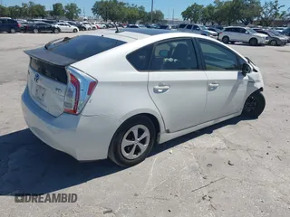 2012 Toyota Prius One with VIN JTDKN3DUXC5463795, listed as a IAAI auction lot 41977678 with 121,190 mi miles and . Bid and sale history available at DreamBid. Image 4.