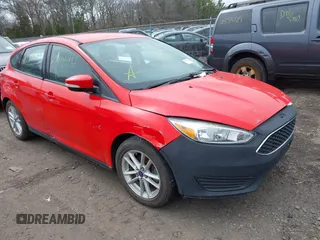 2015 Ford Focus SE with VIN 1FADP3K2XFL223205, listed as a IAAI auction lot 41896693 with 999,999 mi miles. Bid and sale history available at carsss.com. Image 1.