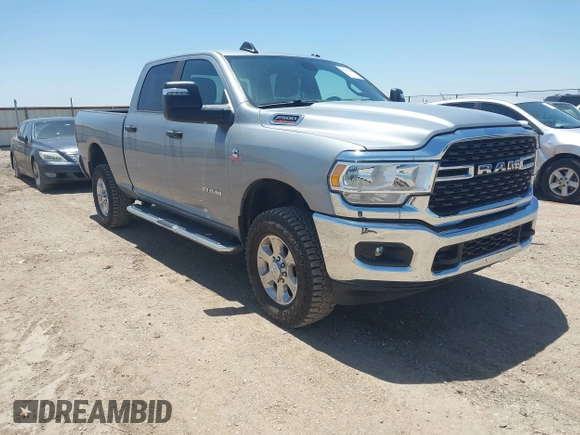 2023 Ram 2500 Big Horn z VIN 3C6UR5DL1PG654074, wystawiony jako IAAI lot #42255020 z przebiegiem 67 732 mil mil oraz . Historia ofert i sprzedaży dostępna na DreamBid. Obrazek 1.