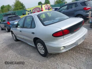 2000 Pontiac Sunfire SE z VIN 1G2JB5249Y7442701, wystawiony jako IAAI lot #42098956 z przebiegiem 99 975 mil mil oraz . Historia ofert i sprzedaży dostępna na DreamBid. Obrazek 3.