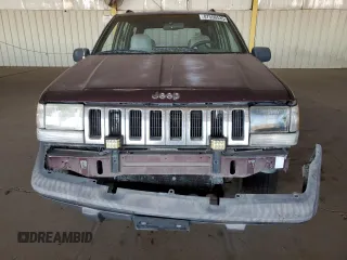 1995 Jeep Grand Cherokee Laredo with VIN 1J4GZ58S1SC704775, listed as a Copart auction lot 87556535 with 266,365 mi miles and Salvage Title. Bid and sale history available at carsss.com. Image 5.