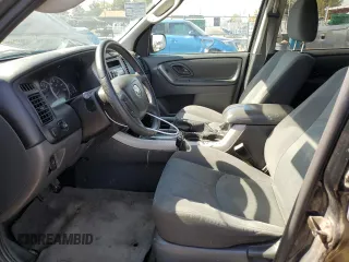 2006 Mazda Tribute i with VIN 4F2YZ02Z16KM36535, listed as a Copart auction lot 74566474 with 254,105 mi miles and Clean Title. Bid and sale history available at carsss.com. Image 7.