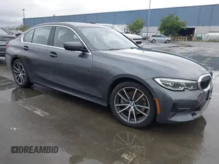2020 BMW 3 Series 330i with VIN WBA5R1C01LFH44947, listed as a IAAI auction lot 41712345 with 137,950 mi miles. Bid and sale history available at carsss.com. Image 1.