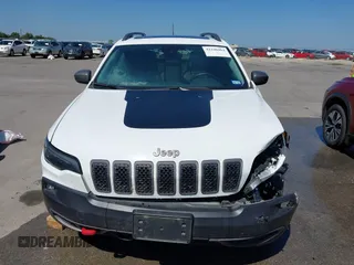 2021 Jeep Cherokee Trailhawk with VIN 1C4PJMBX1MD145169, listed as a IAAI auction lot 42340464 with 50,925 mi miles and . Bid and sale history available at DreamBid. Image 12.