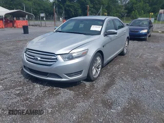 2013 Ford Taurus Limited with VIN 1FAHP2F87DG235392, listed as a IAAI auction lot 42700160 with 123,904 mi miles and . Bid and sale history available at DreamBid. Image 2.