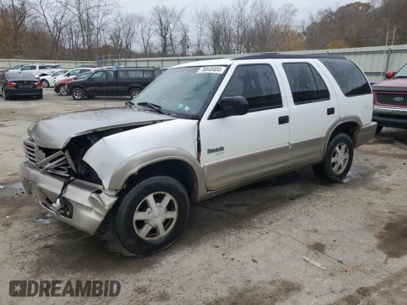 1999 Oldsmobile Bravada z VIN 1GHDT13W6X2718787, wystawiony jako Copart lot #78848404 z przebiegiem 229 665 mil mil oraz Szkody całkowita. Historia ofert i sprzedaży dostępna na DreamBid. Obrazek 1.