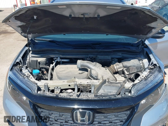 2021 Honda Passport EX-L with VIN 5FNYF8H51MB024752, listed as a IAAI auction lot 41858129 with 77,545 mi miles and . Bid and sale history available at DreamBid. Image 10.