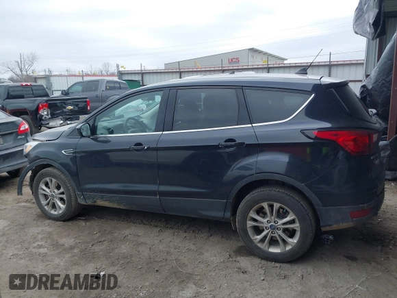 2019 Ford Escape SE with VIN 1FMCU9G91KUC08423, listed as a IAAI auction lot 41686542 with 87,329 mi miles. Bid and sale history available at carsss.com. Image 15.