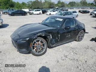 2021 Mazda MX-5 Miata Grand Touring z VIN JM1NDAM7XM0456083, wystawiony jako Copart lot #52894705 z przebiegiem 86 050 mil mil oraz Szkoda całkowita • Salvage title. Historia ofert i sprzedaży dostępna na DreamBid. Obrazek 1.