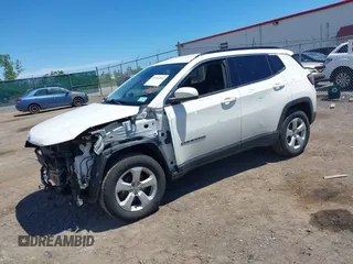 2020 Jeep Compass Latitude with VIN 3C4NJDBBXLT219466, listed as a IAAI auction lot 39766901 with 147,492 mi miles and . Bid and sale history available at DreamBid. Image 2.